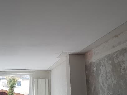 Men at Work Stukadoors foto 1